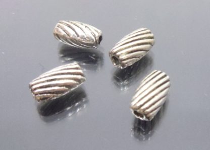 50 יח' חרוזי מתכת ניקל ספירלה 7X4ממ